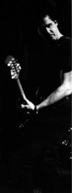 Krist playing his bass